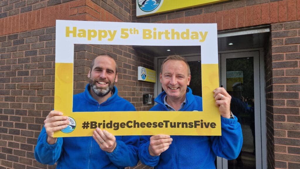 Operations director Martin Bowden and managing director Michael Harte celebrate Bridge Cheese turning five 1