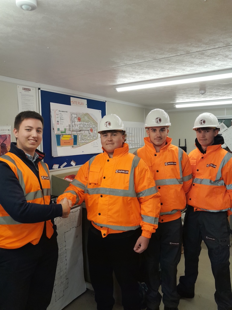 Trainee QS George Hampson ( left ) welcomes new colleagues Alfie Flack Jaydee ONeill and Josh Freestone Gittins