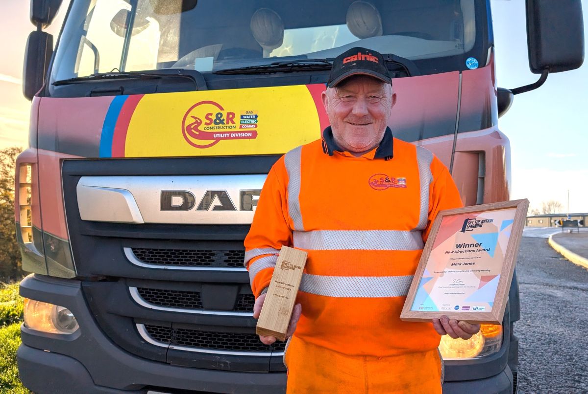 Mark Jones with his award