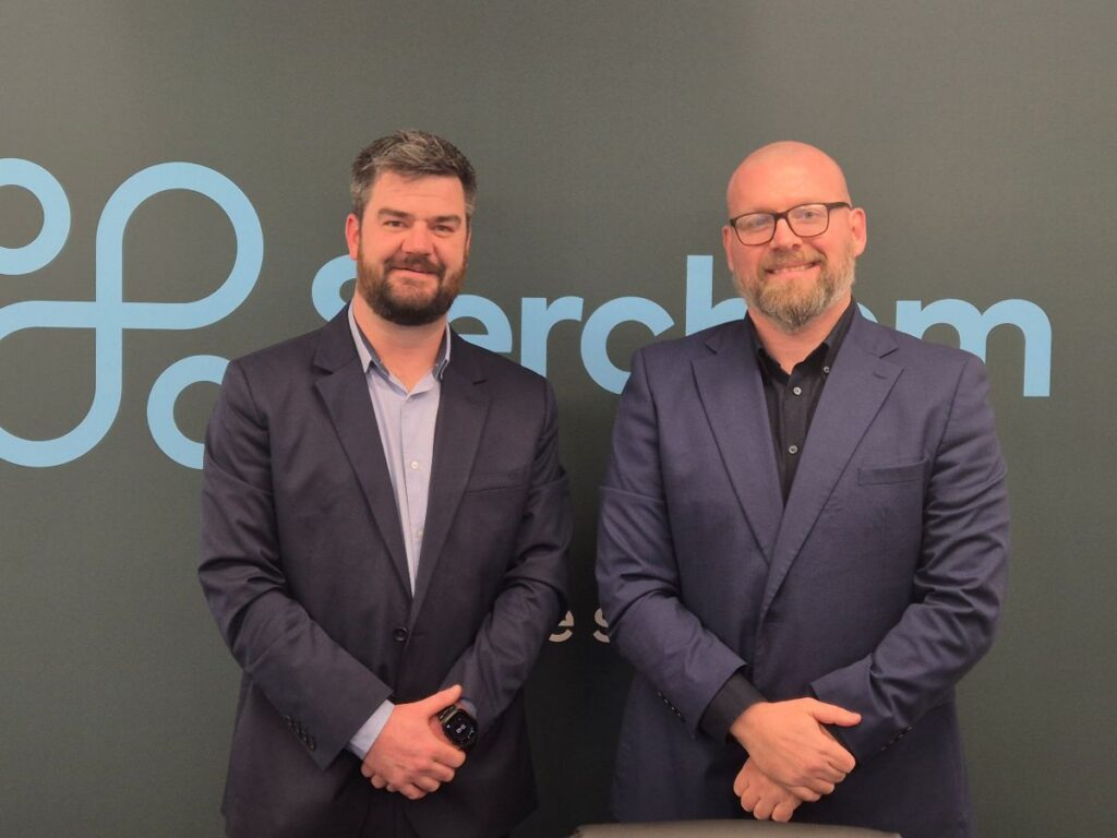 Daniel Collins and Garry Horrigan from Serchem in Telford celebrate their promotions