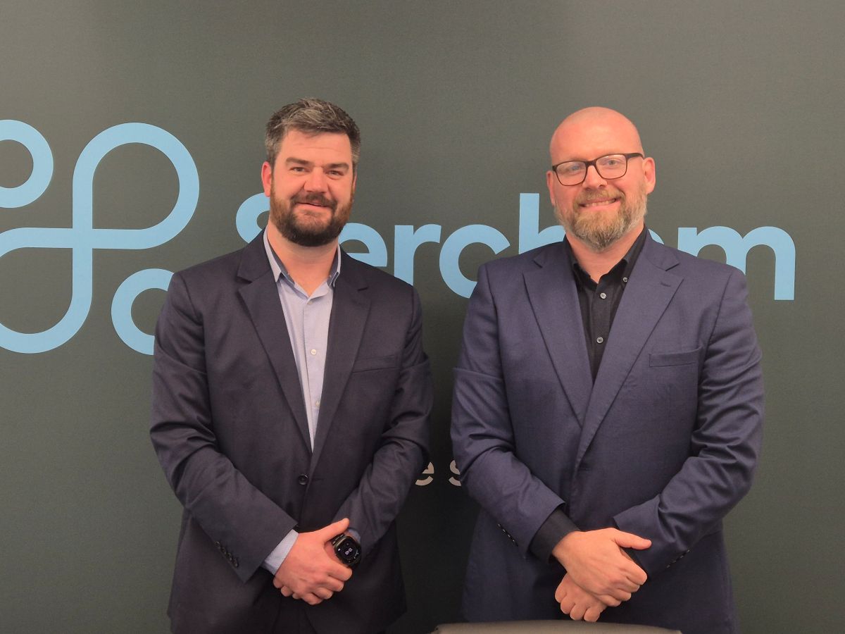 Daniel Collins and Garry Horrigan from Serchem in Telford celebrate their promotions