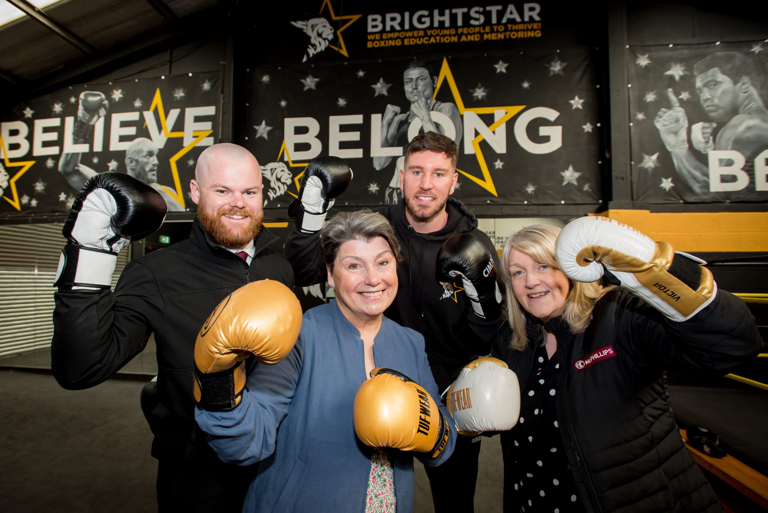 (L R) Jack Clements (McPhillips) Sonia Roberts (trustee at Shropshire Community Foundation) Joe Lockley (Brightstar Boxing) and Val Hardy (McPhillips)