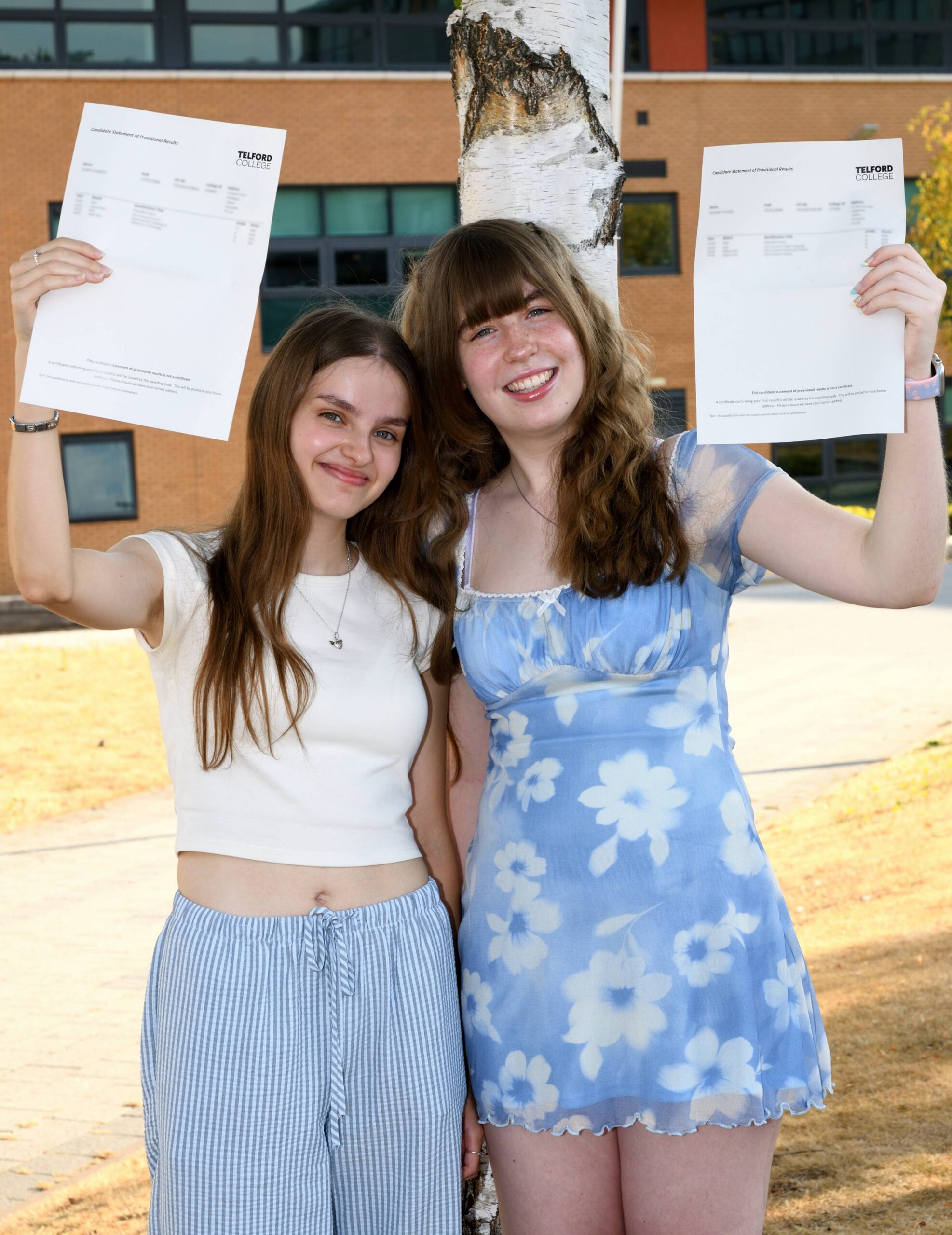 From left Telford College A level students Sophie Vaughan and Summer Costello celebrate excellent results (1)